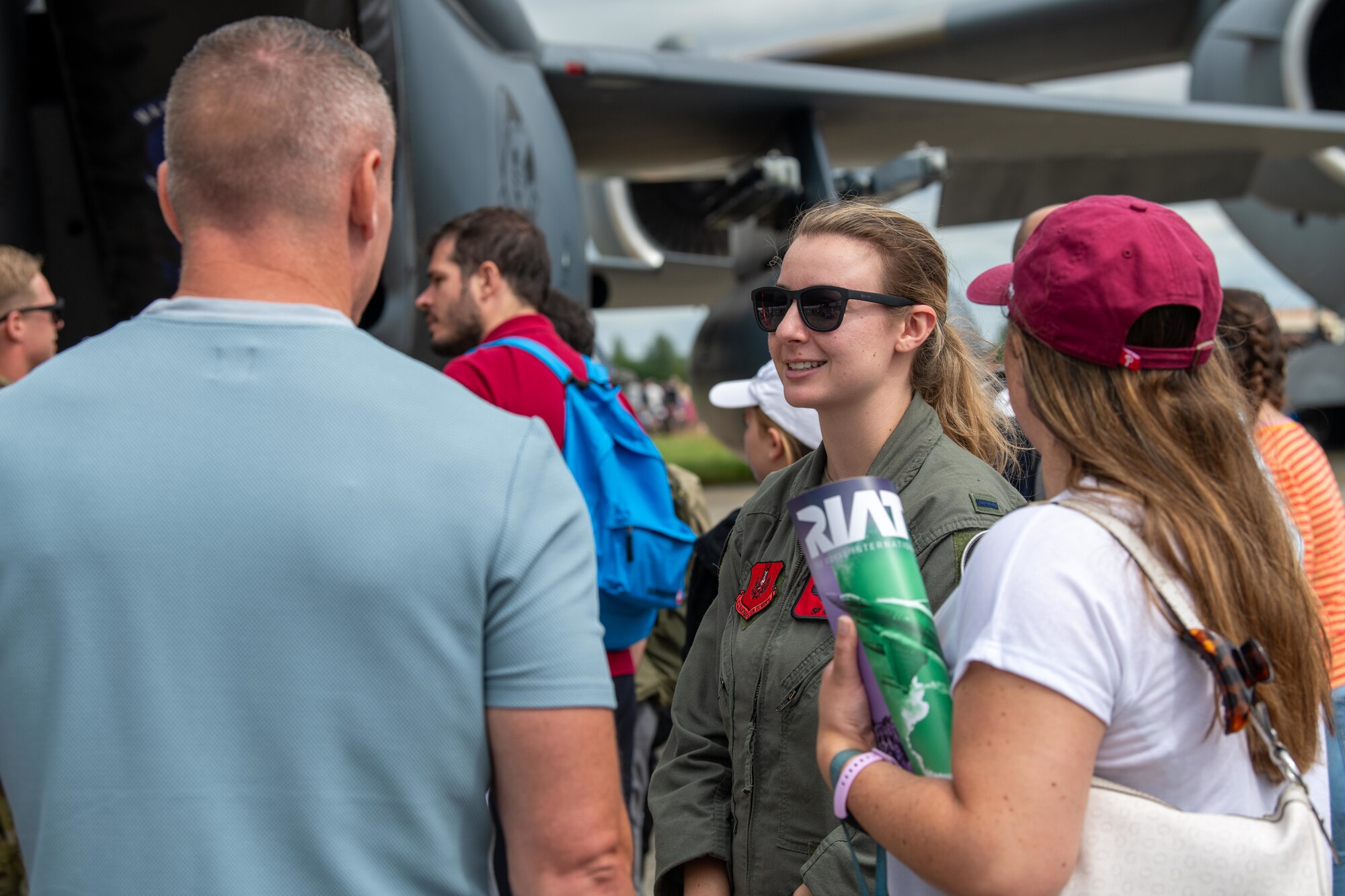 An Airman speaks with attendees during the Royal International Air Tattoo