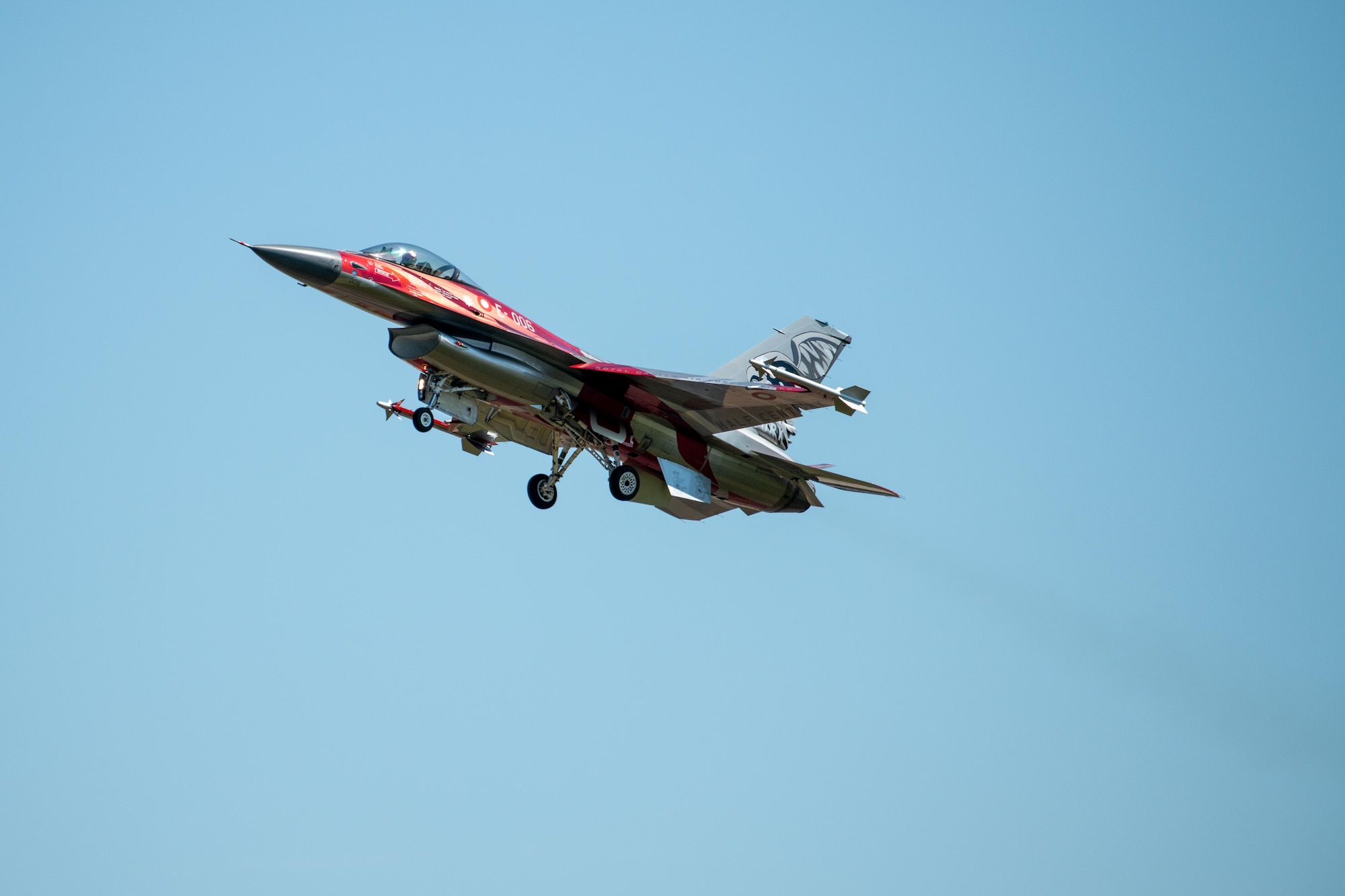 A Royal Danish Air Force F-16AM Fighting Falcon conducts an aerial demonstration