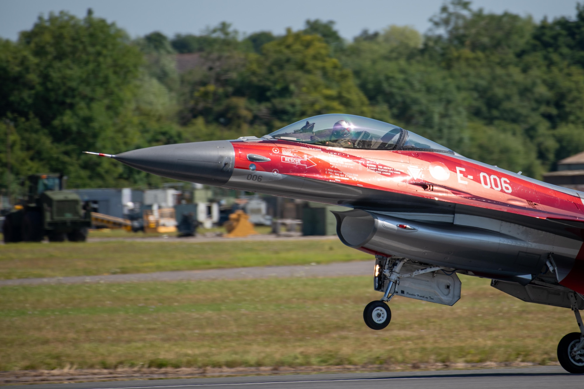 A Royal Danish Air Force F-16AM Fighting Falcon lands on the runway during the Royal International Air Tattoo