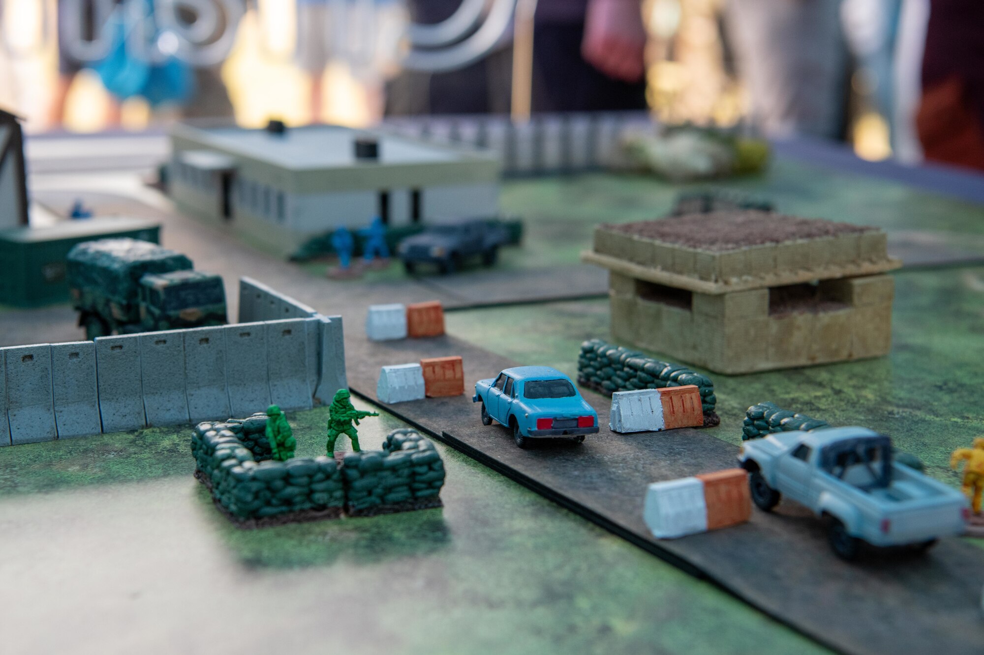 Game pieces for "Integrated Defense Tabletop Training" are displayed