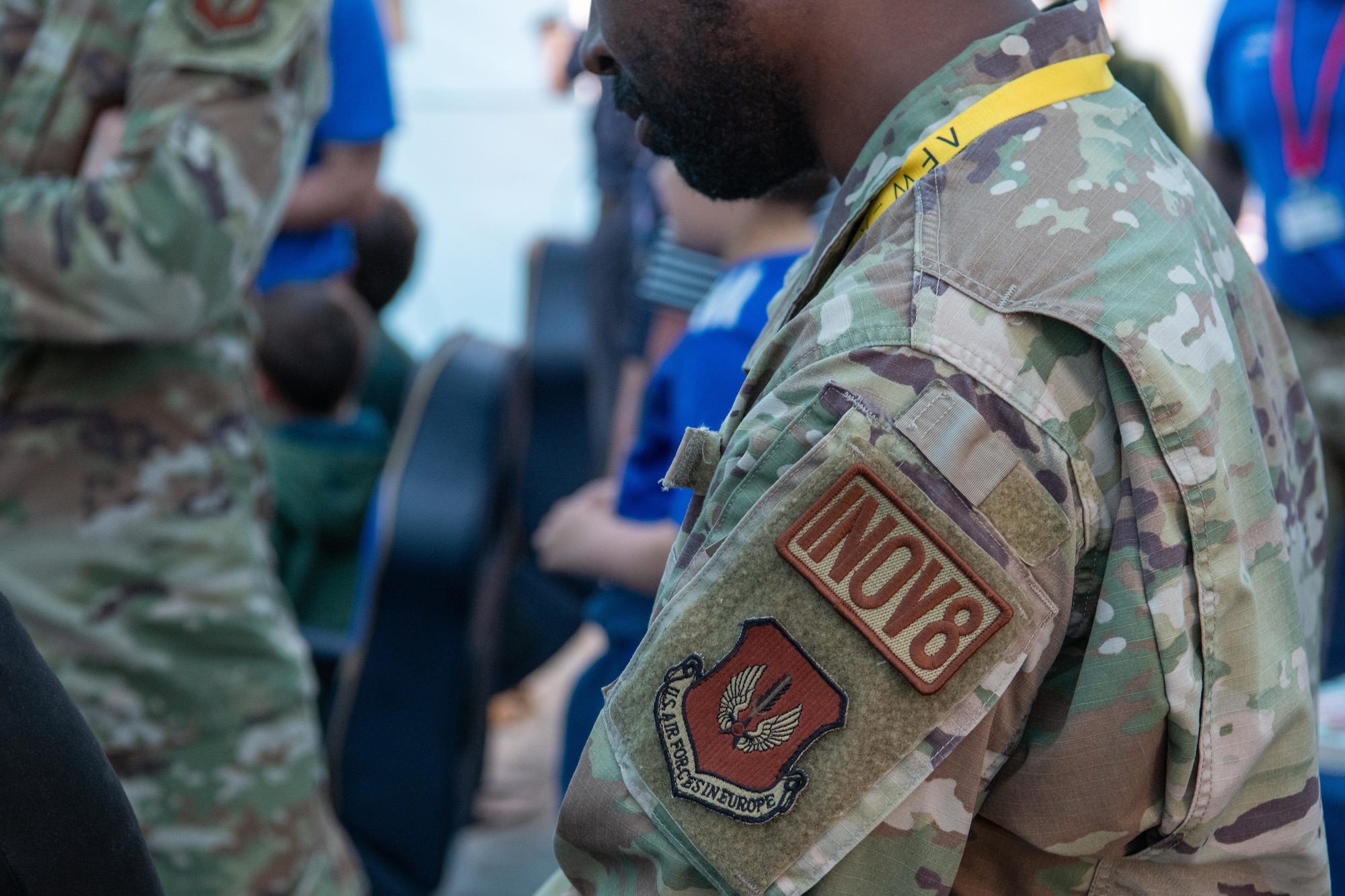 A patch reading “INOV8” or “Innovate” is worn on an Airman's uniform
