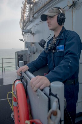 240723-N-EY348-1054
SINGAPORE – Operation Specialist Seaman Aiden Blanchette, from Leesville, South Carolina, stands watch on the aft lookout aboard U.S. 7th Fleet flagship USS Blue Ridge (LCC 19) while mooring at Changi Naval Base, Singapore, July 23, 2024. As the 7th Fleet flag ship, Blue Ridge is the oldest operational ship in the Navy and routinely operates with allies and partners in preserving a free and open Indo-Pacific region.  (U.S. Navy photo by Mass Communication Specialist 3rd Class Charlotte Duran)