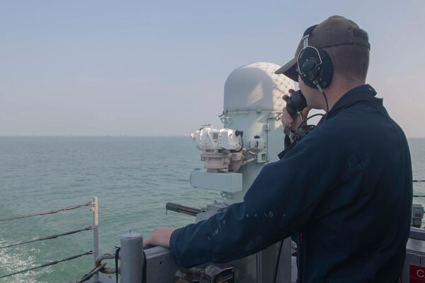 240723-N-EY348-1041
SINGAPORE  – Operation Specialist Seaman Aiden Blanchette, from Leesville, South Carolina, stands aft lookout watch aboard U.S. 7th Fleet flagship USS Blue Ridge (LCC 19) while mooring Changi Naval Base, Singapore, July 23, 2024. As the 7th Fleet flag ship, Blue Ridge is the oldest operational ship in the Navy and routinely operates with allies and partners in preserving a free and open Indo-Pacific region.  (U.S. Navy photo by Mass Communication Specialist 3rd Class Charlotte Duran)