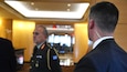 An Army CID special agent stands watch near a NATO defense minister during the NATO 75th Anniversary Summit in Washington, D.C., on July 11, 2024.