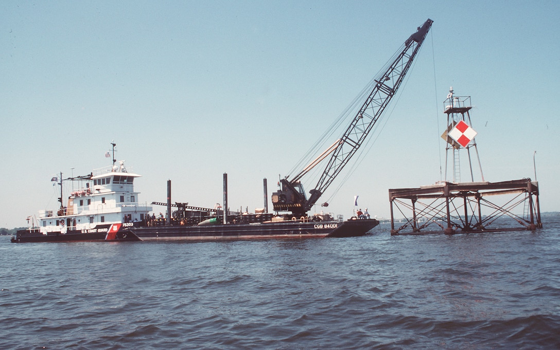 (May 6)-- A Coast Guard inland construction tender tends to one of the many aids.  U.S. COAST GUARD PHOTO