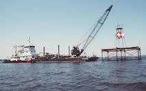 (May 6)-- A Coast Guard inland construction tender tends to one of the many aids.  U.S. COAST GUARD PHOTO