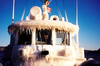 Pilothouse icing aboard one of the U.S. Coast Guard's small harbor tugs, the CGC Line (WYTL 65611) on the Hudson River. USCG photo by PA3 Robert Lanier