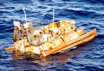 A raft which Cuban migrants were found aboard and picked up by the U.S. Coast Guard. The "hull" of this raft was made from an old fuel tank. USCG photo by SMITH, CHARLES PA1.
990917-M-5200S-016