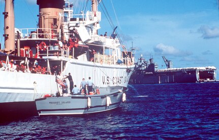 A Navy patrol boat, the Whidbey Island, moors alongside a Coast Guard cutter before the cutter gets underway assisting in Operation Able Vigil between Cuba and the Florida Keys.