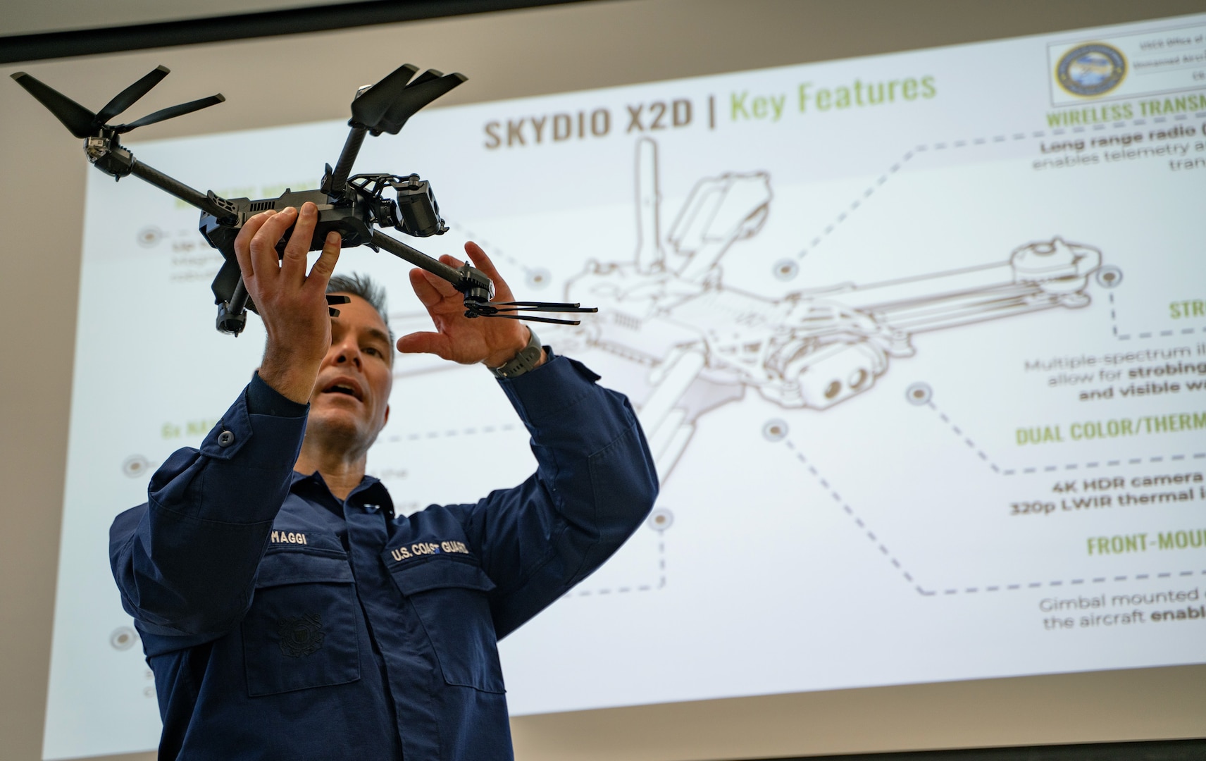 Capt. Brian Maggi, Head of Civil Engineering at the Coast Guard Academy, holds up a drone during a training course at the Coast Guard Academy, New London, Conn, Feb 21, 2023. The Coast Guard Short Ranged Unmanned Aerial Systems (SR-UAS) program is designed to create designated pilots and integrate drone capabilities into various missions. (U.S. Coast Guard photograph by Petty Officer 3rd Class Matt Thieme)