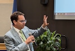 IMAGE: John Romano, head of the Aeronautics, Hypersonic Design & Analysis Branch at Naval Surface Warfare Center Dahlgren Division, reviews the schedule at the Modeling & Simulation (M&S) and Model-Based Systems Engineering (MBSE) Summit July 16 at University of Mary Washington’s Dahlgren Campus. Romano has led the annual summit for six years.
