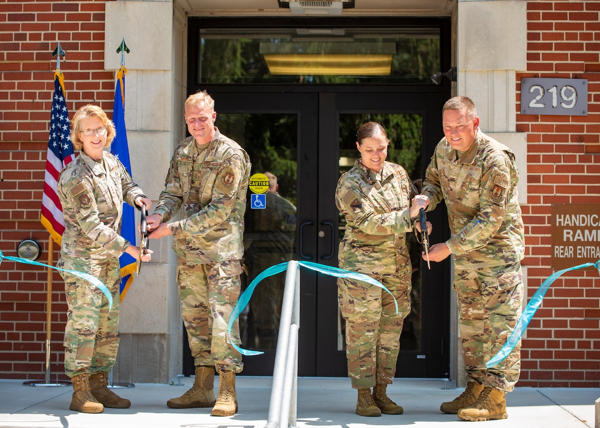Lt. Gen. Donna D. Shipton, commander of the Air Force Life Cycle Management Center, Chief Master Sgt. Timothy J. Wieser, command chief of AFLCMC, Chief Master Sgt. Tessa Fontaine, command chief of the 88th Air Base Wing, and Col. Travis Pond, deputy commander of 88 ABW, cut the ceremonial ribbon during a ceremony for the newly opened Resiliency Center on Wright-Patterson Air Force Base, Ohio, July 15, 2024.