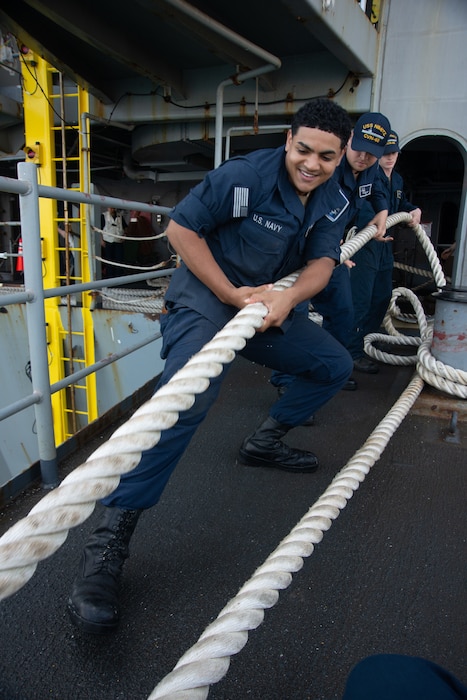 Sailors heave line on the fantail of the aircraft carrier USS Nimitz (CVN 68), July 22, 2024, at Naval Air Station North Island.