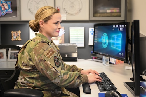 U.S. Air Force Staff Sgt. Alyson Silidker, 344th Recruiting Squadron enlisted accessions recruiter, scrolls through recruit files at her desk at the San Angelo Air Force Recruiting office in San Angelo, Texas, July 3, 2024. Silidker wants to continue to work with and influence junior enlisted going forward in her career. (U.S. Air Force photo by Airman 1st Class Madison Collier)