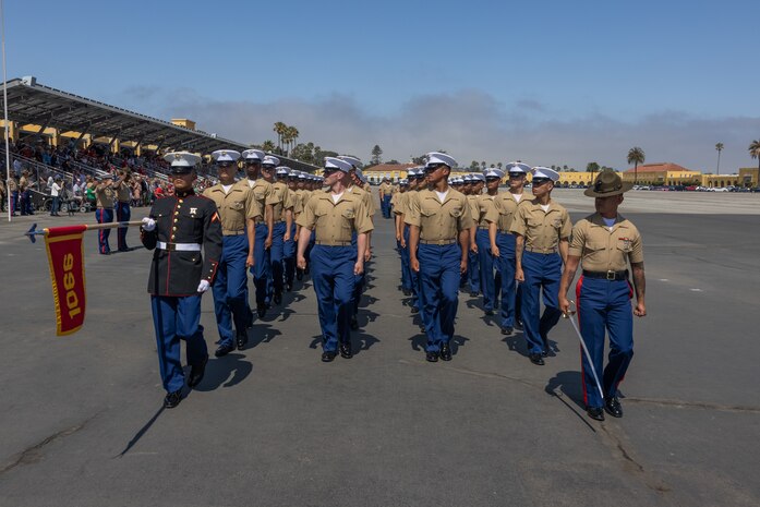 U.S. Marines with Delta Company, 1st Recruit Training Battalion, march in formation during a graduation ceremony at Marine Corps Recruit Depot San Diego, California, July 19, 2024, 2024. Graduation took place at the completion of the 13-week transformation, which included training for drill, marksmanship, basic combat skills, and Marine Corps customs and traditions. (U.S. Marine Corps photo by Lance Cpl. Jacob B. Hutchinson)