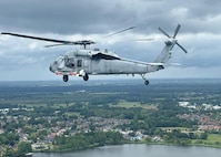 An MH-60S Seahawk helicopter configured with the Airborne Mine Neutralization System (AMNS) conducts a mine countermeasure exercise during the 2024 Baltic Operations Exercise. During the exercise, two Naval Surface Warfare Center Panama City Division technical capabilities were demonstrated: A significant mine countermeasure operation was carried out, involving an MH-60S helicopter equipped with the AMNS system to combat moored mines, and the innovative Common Undersea Visualization and Exploitation Tool capability granted fleet users enhanced situational awareness for better strategic decision-making. (U.S. Department of Defense photo)