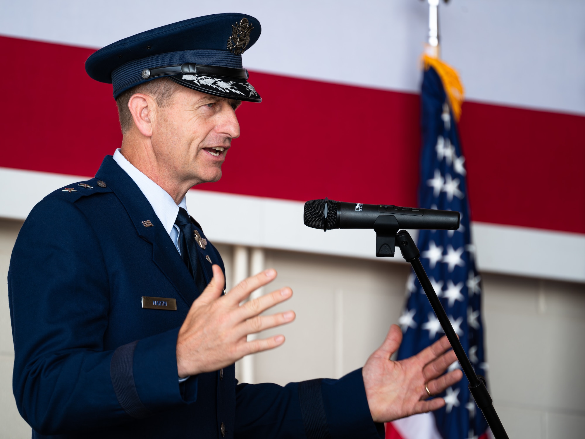 U.S. Air Force Maj. Gen. Corey Martin, 18th Air Force commander, gives remarks as presiding officer during the 317th Airlift Wing change of command ceremony at Dyess Air Force Base, Texas, July 23, 2024. During the ceremony, Col. Thomas Lankford, 317th AW commander, relinquished command to Col. Justin Diehl. (U.S. Air Force photo by Airman 1st Class Jade M. Caldwell)