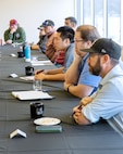 More than 100 Electrical Community of Practice representatives from all four public shipyards participate in a three-day annual conference May 23, 2024, at the Kitsap Conference Center in downtown Bremerton, Washington. ECOP members gather once a year to connect and share information pertinent to the Navy's mission. Puget Sound Naval Shipyard & Intermediate Maintenance Facility had the honor of hosting the annual event for the first time in eight years. (U.S. Navy photo by Wendy Hallmark)