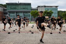 U.S. Army cadets participate in a physical fitness session at the Republic of Korea Cadet Military School in Goesun-gun, Chungcheongbuk-do, South Korea, July 17, 2024.