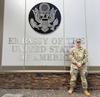 Maj. Zackary Taylor-Warren stands near the entrance to the U.S. Embassy in Fiji July 22, 2024. Taylor-Warren became bilateral affairs officer in the Nevada National Guard this spring and immediately faced multiple high-profile events in the strategically vital South Pacific.
