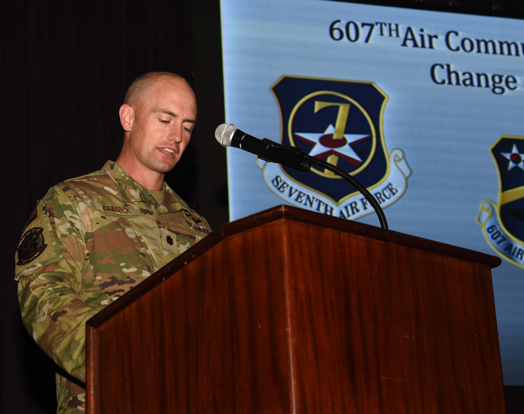 U.S. Air Force Lt. Col. Matthew Babcock, 607th Air Communications Squadron commander, gives his first speech to his squadron during a change of command ceremony at Osan Air Base, Republic of Korea, July 19, 2024. A change of command ceremony marks a smooth leadership transition, essential for preserving unit cohesion within the 7th Air Force. (U.S. Air Force photo by Staff Sgt. Kahdija Slaughter)