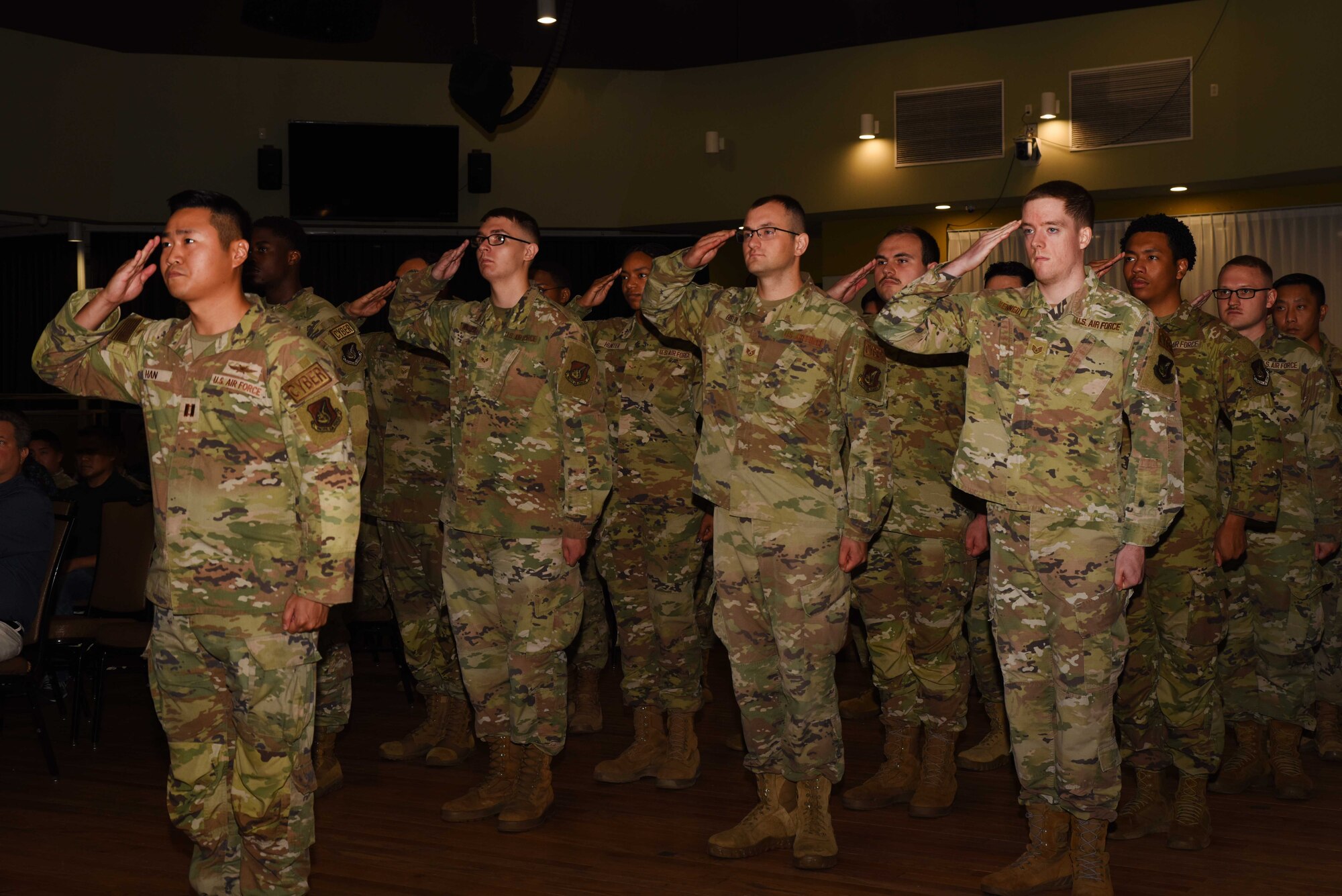 Airmen assigned to the 607th Air Communications Squadron render their first salute to their new commander, Lt. Col. Matthew Babcock, during a change of command ceremony at Osan Air Base, Republic of Korea, July 19, 2024. The 607th ACOMS is responsible for projecting and protecting intelligence, surveillance, and reconnaissance for command and control throughout the ROK. (U.S. Air Force photo by Staff Sergeant Kahdija Slaughter)