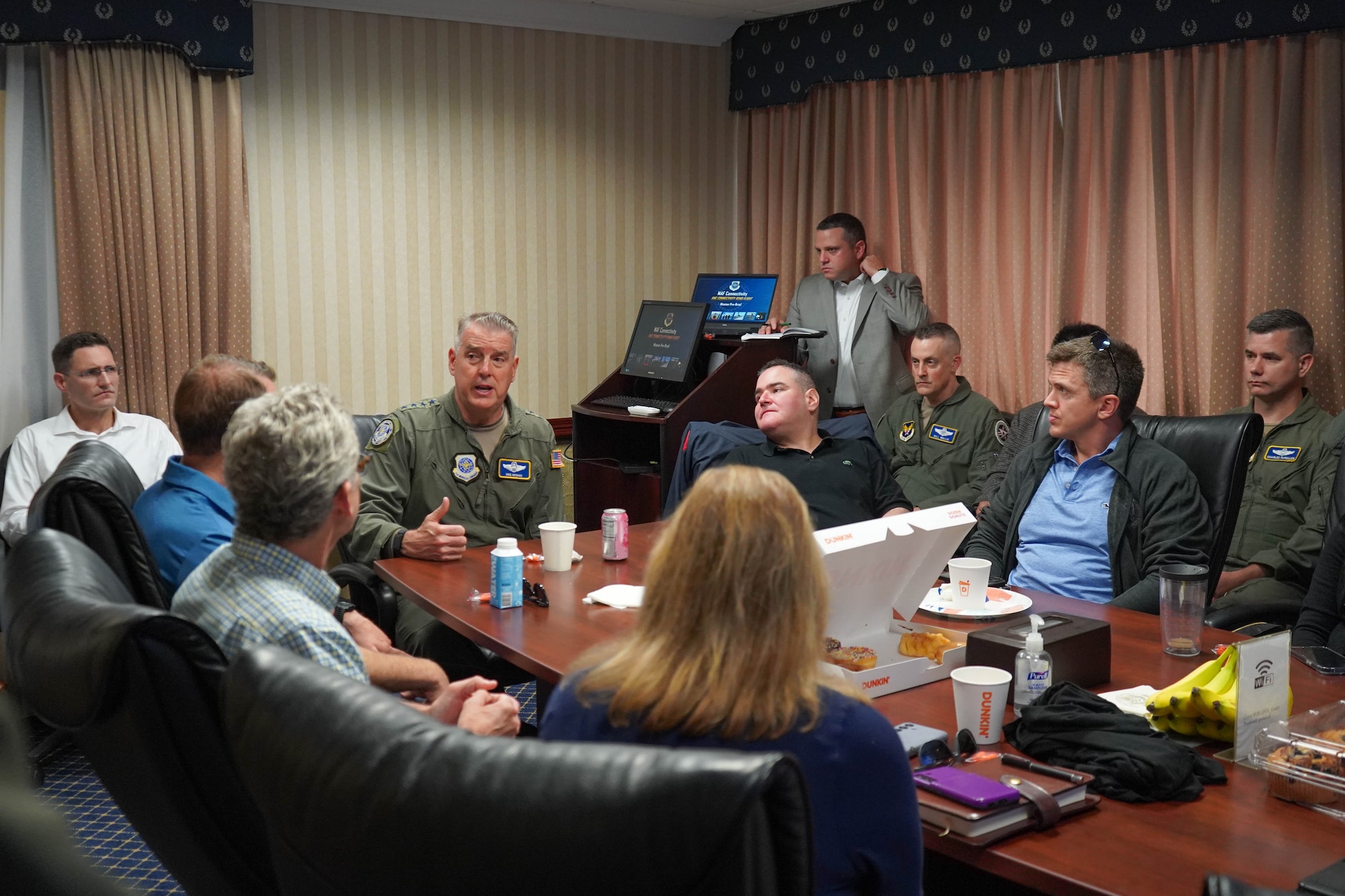 Gen Mike Minihan, Air Mobility Command commander, briefs a Congressional delegation on the importance of connectivity across the mobility fleet before their demonstration flight aboard a KC-135 Stratotanker at Joint Base Andrews, Maryland, July 22, 2024. The Fairchild AFB KC-135, equipped with a Real-Time Information in the Cockpit data link system, conducted a refueling mission with F-16s and a KC-46 while showcasing the RTIC system’s capabilities. The demonstration was completed ahead of​ Minihan’s testimony to House Armed Services Committee subcommittee for Seapower and Projection Forces where he provided an informational update on mobility aircraft connectivity capabilities, crucial in today’s security environment. (U.S. Air Force photo by Staff Sgt. Gabrielle Winn)