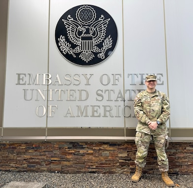 Maj. Zackary Taylor-Warren stands near the entrance to the U.S. Embassy in Fiji July 22, 2024. Taylor-Warren became bilateral affairs officer in the Nevada National Guard this spring and immediately faced multiple high-profile events in the strategically vital South Pacific.