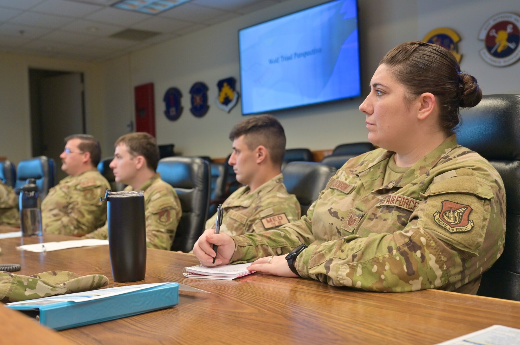 Tech. Sgt. Amanda Jackson, 8th Operations Support Squadron plans section chief and class attendee, takes notes during the Wolf Pack Flight Leadership Course.