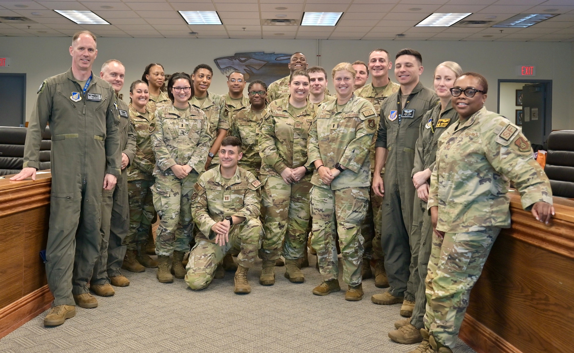 Participants of the Wolf Pack Flight Leadership Course stand for a group photo in the 8th Fighter Wing conference room.