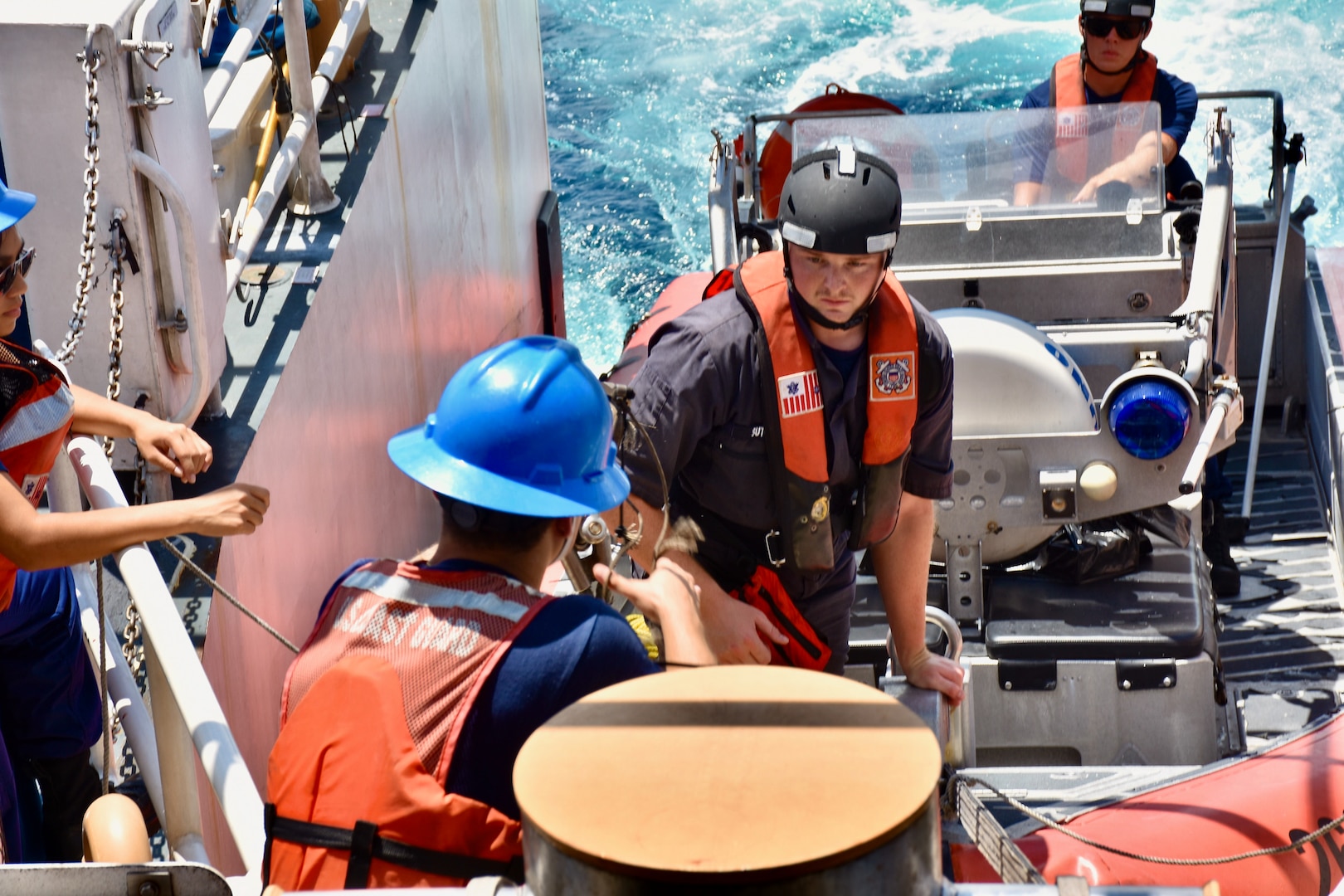 The crew of the USCGC Oliver Henry (WPC 1140) recover the small boat after they completed the rescue operation of the motor yacht Black Pearl 1 and the 11 crew aboard, ensuring its safe arrival and mooring in the Republic of Palau on July 22, 2024. At 11:22 a.m. ChST, the Oliver Henry crew transferred the Black Pearl's tow to the 75-foot Palau-flagged tug SSC Techall, just offshore Palau. (U.S. Coast Guard photo)