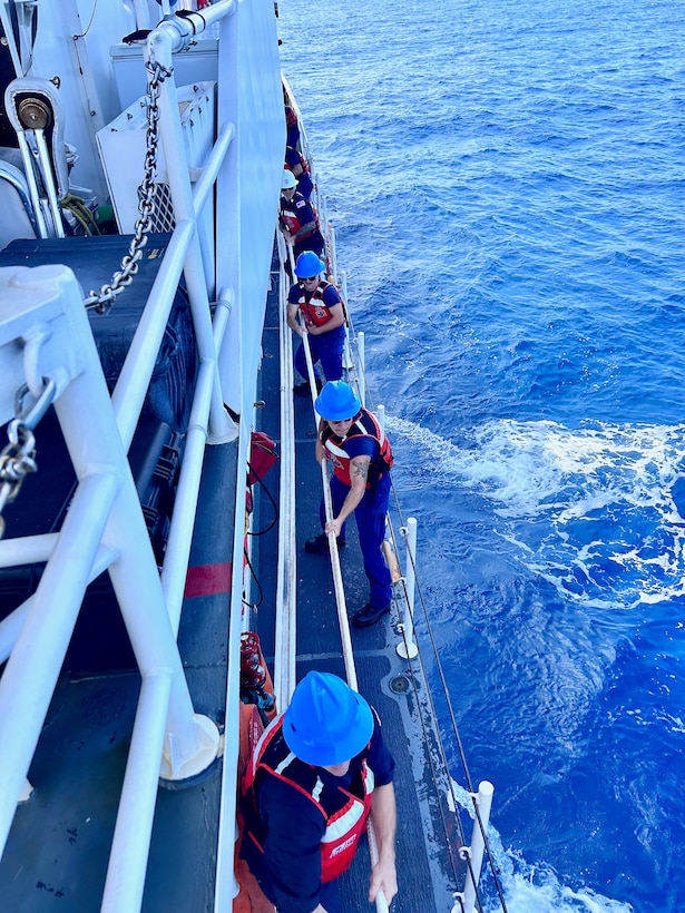 The crew of the USCGC Oliver Henry (WPC 1140) tow the motor yacht Black Pearl 1 and the 11 crew aboard in the Pacific Ocean, ensuring its safe arrival and mooring in the Republic of Palau on July 22, 2024. At 11:22 a.m. ChST, the Oliver Henry crew transferred the Black Pearl's tow to the 75-foot Palau-flagged tug SSC Techall, just offshore Palau. (U.S. Coast Guard photo)