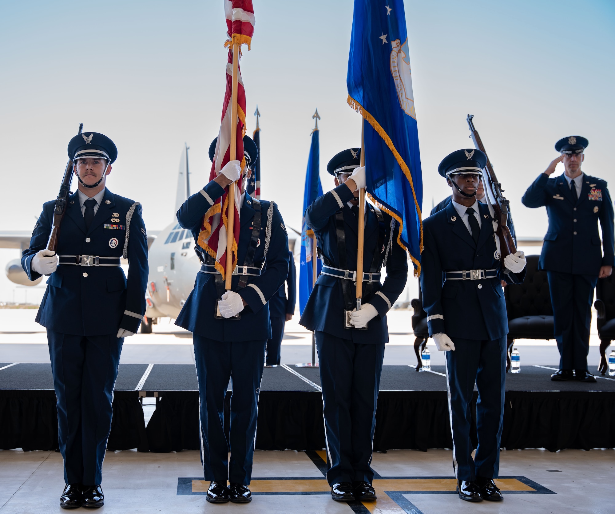 The Cannon Air Force Base Honor Guard presents the colors during a ceremony that simultaneously realigned the 6th Special Operations Squadron and activated the 6th Special Operations Aircraft Maintenance Squadron under the 492nd Special Operations Wing, July 9, 2024, at Cannon Air Force Base, New Mexico.