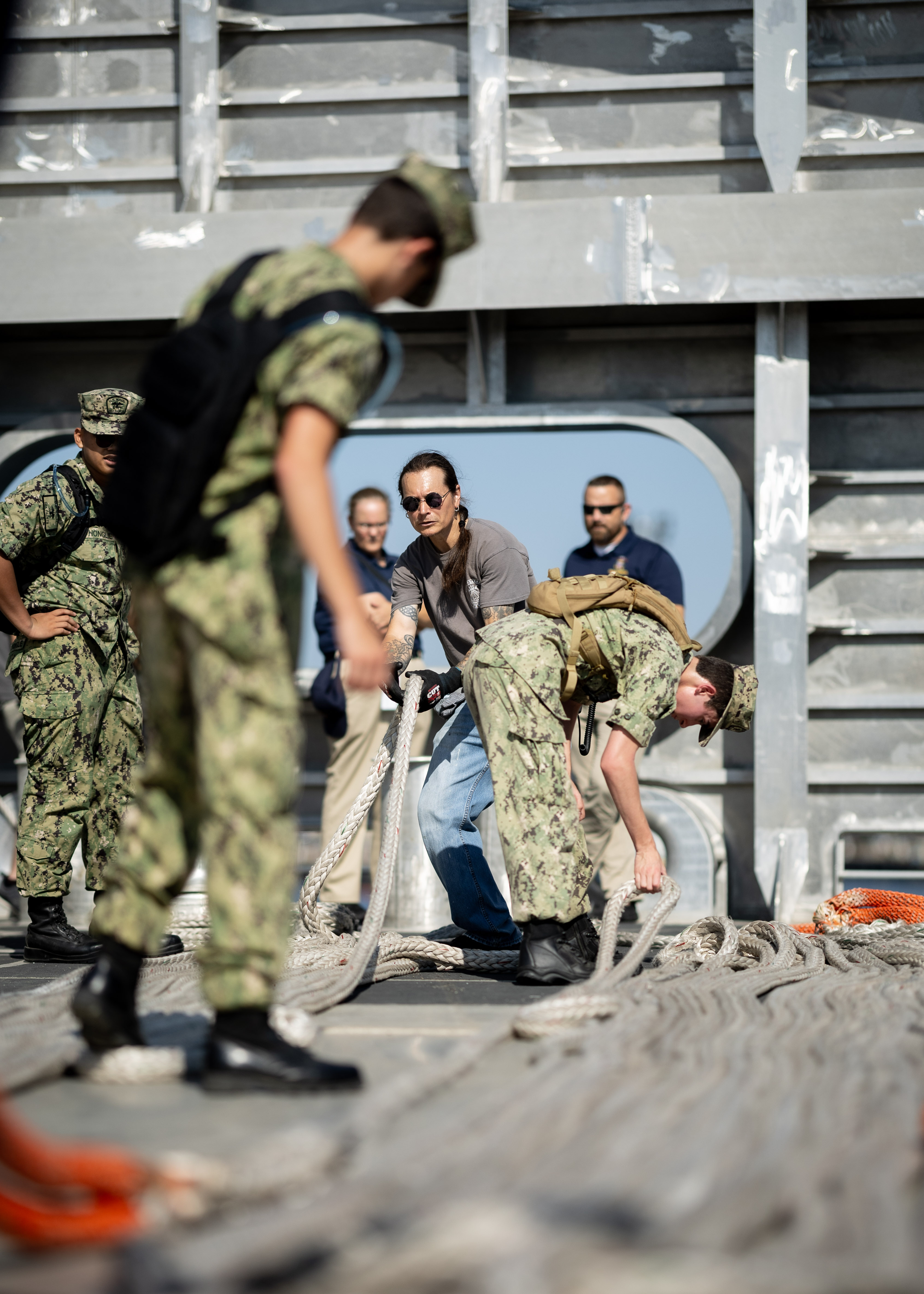 U.S. Naval Sea Cadets learn how to lay out mooring lines during an underway aboard USNS Apalachicola (EPF 13) July 15, 2024. During the underway, cadets spent time aboard a sea-going vessel to learn about the ship's day-to-day operations.