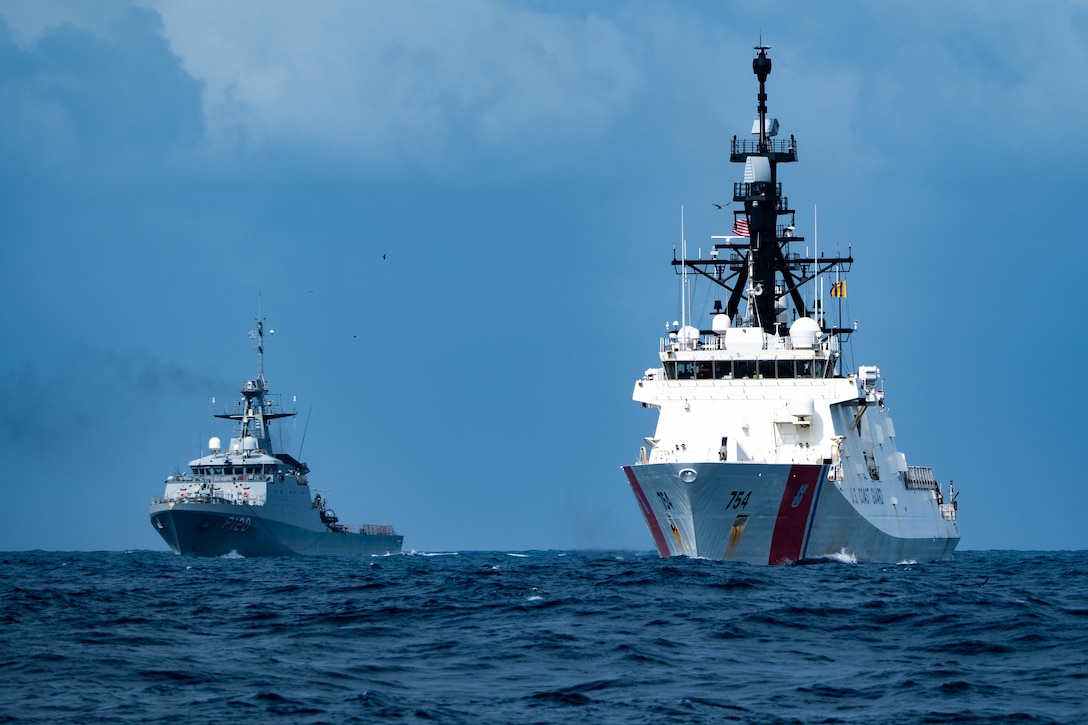 The U.S. Coast Guard Cutter James (WMSL 754) and the Brazilian navy Amazonas (P 120) conduct a passing exercise at sea in the southern Atlantic Ocean, May 25, 2024. The James and the Amazonas worked to execute tactical boat handling skills at sea. (U.S. Coast Guard photo by Petty Officer 3rd Class Logan Kaczmarek)