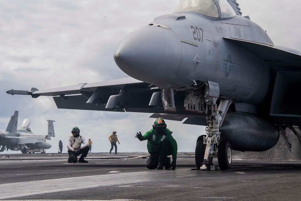 Sailors conduct flight operations aboard Nimitz-class aircraft carrier USS Carl Vinson (CVN 70) as the ship participates in the at-sea phase of Exercise Rim of the Pacific (RIMPAC) 2024 July 20.