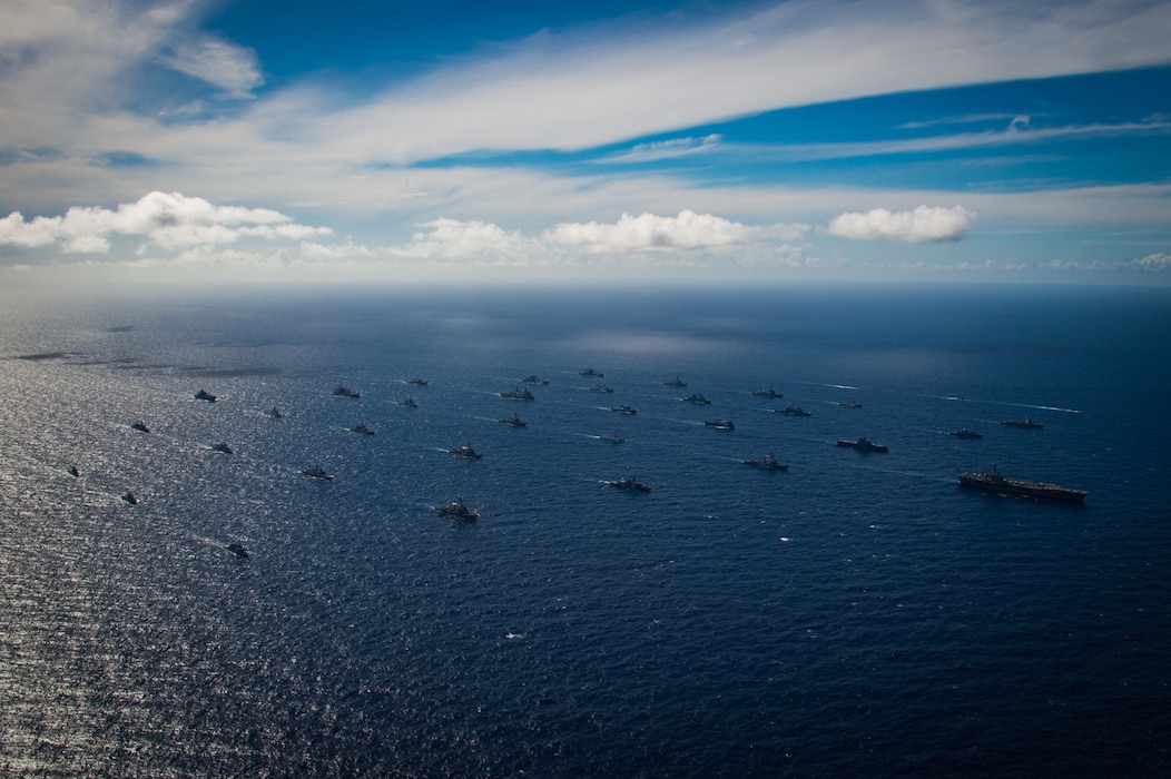 Multinational ships sail in formation July 22, off the coast of Hawaii during Exercise Rim of the Pacific (RIMPAC) 2024.