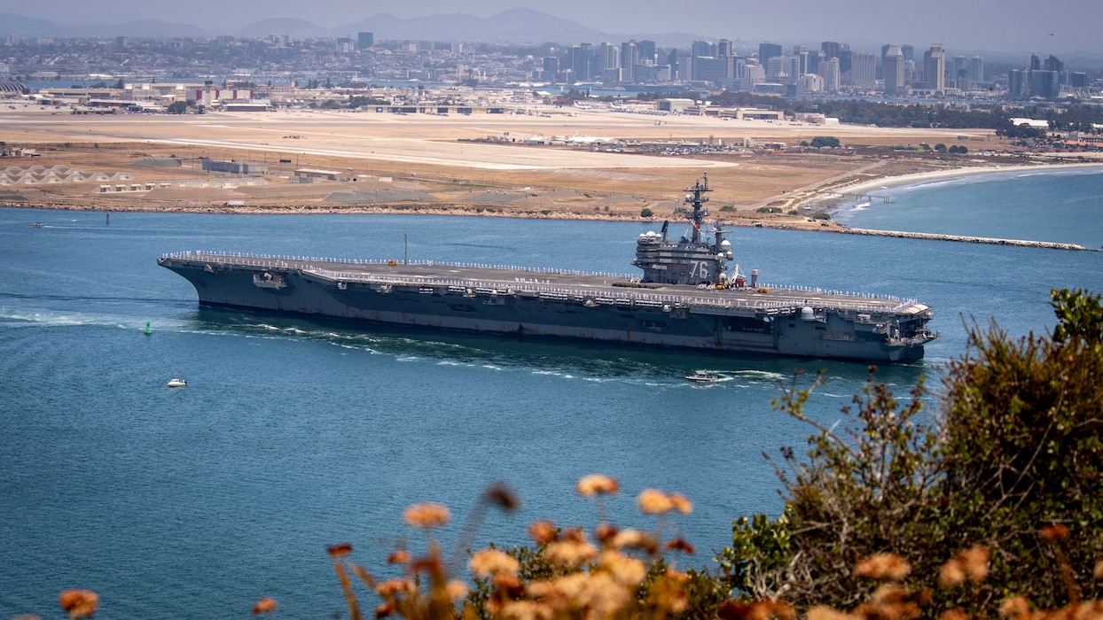 Nimitz-class aircraft carrier USS Ronald Reagan (CVN 76) transits the San Diego Bay, as seen from Cabrillo National Monument, San Diego, Calif., July 23, 2024.