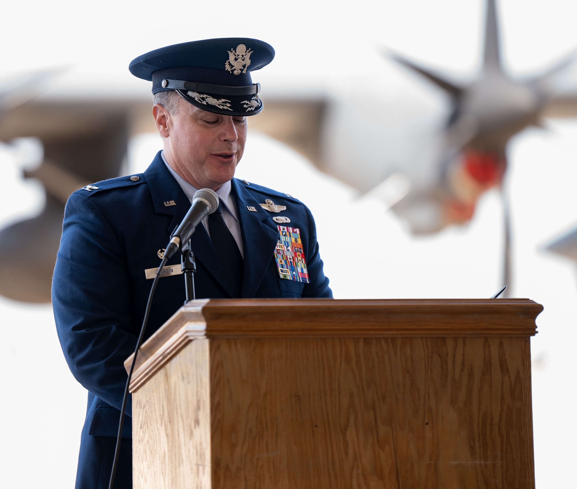 U.S. Air Force Col. Jeremy Bergin, 27th Special Operations Wing commander, speaks at a ceremony that simultaneously realigned the 6th Special Operations Squadron and activated the 6th Special Operations Aircraft Maintenance Squadron, July 9, 2024, at Cannon Air Force Base, New Mexico.