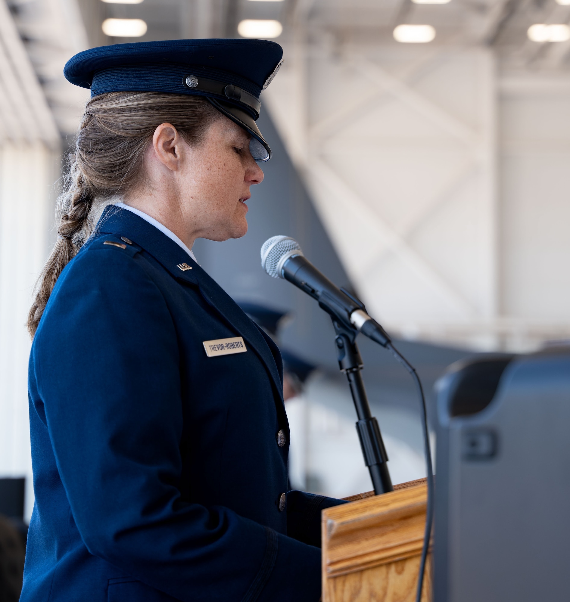 U.S. Air Force 1st Lt. Catherine Trevor-Roberts, 16th Special Operations Aircraft Maintenance Squadron chaplain, gives the benediction during a ceremony that simultaneously realigned the 6th Special Operations Squadron and activated the 6th Special Operations Aircraft Maintenance Squadron under the 492nd Special Operations Wing, July 9, 2024, at Cannon Air Force Base, New Mexico.