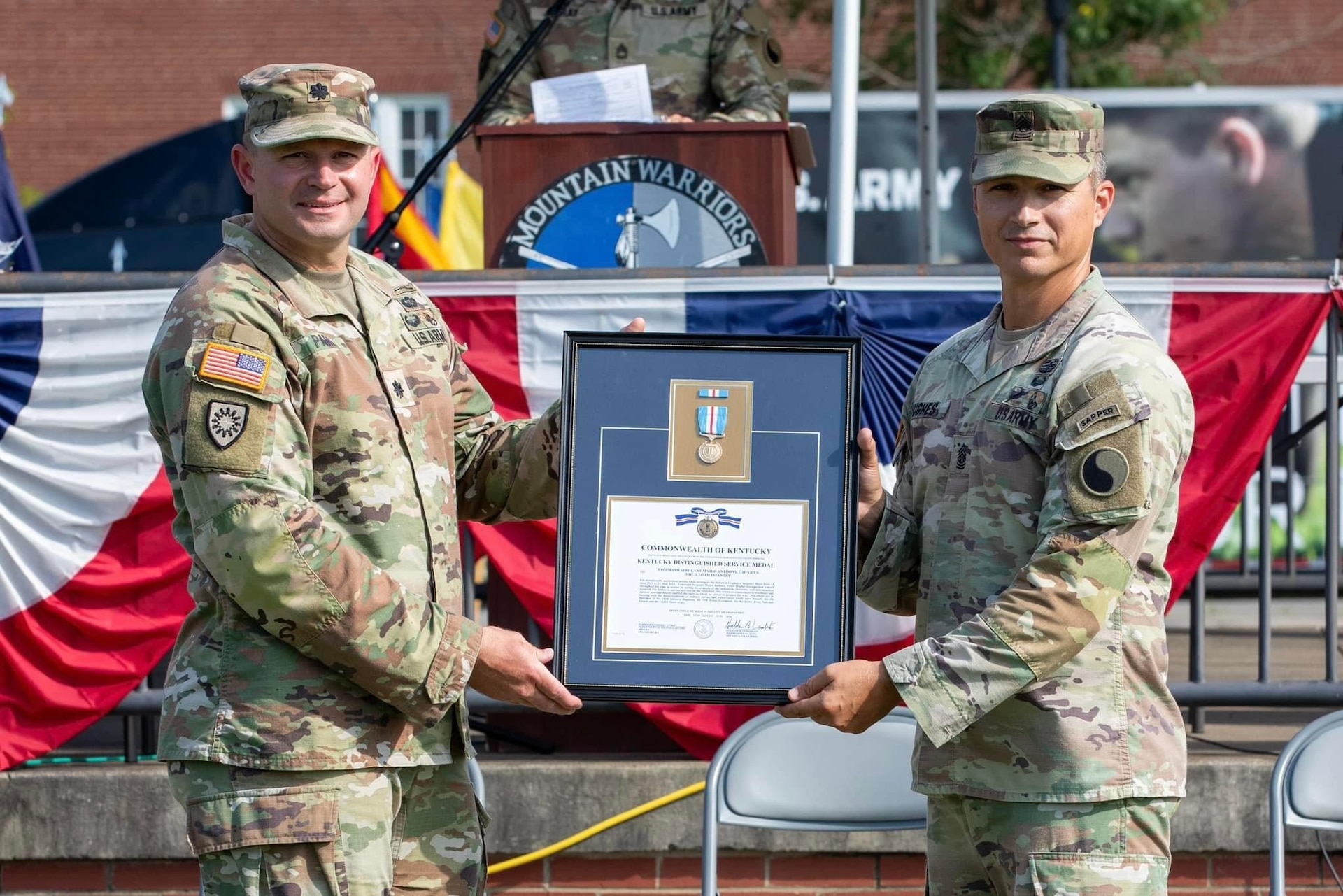 The 1st Battalion, 149th Infantry Regiment conducts a Change of Responsibility ceremony between outgoing Command Sgt. Maj. Anthony Hughes and incoming Command Sgt. Maj. Tim Lewis, during annual training at Fort Knox, Kentucky, July 20,2024