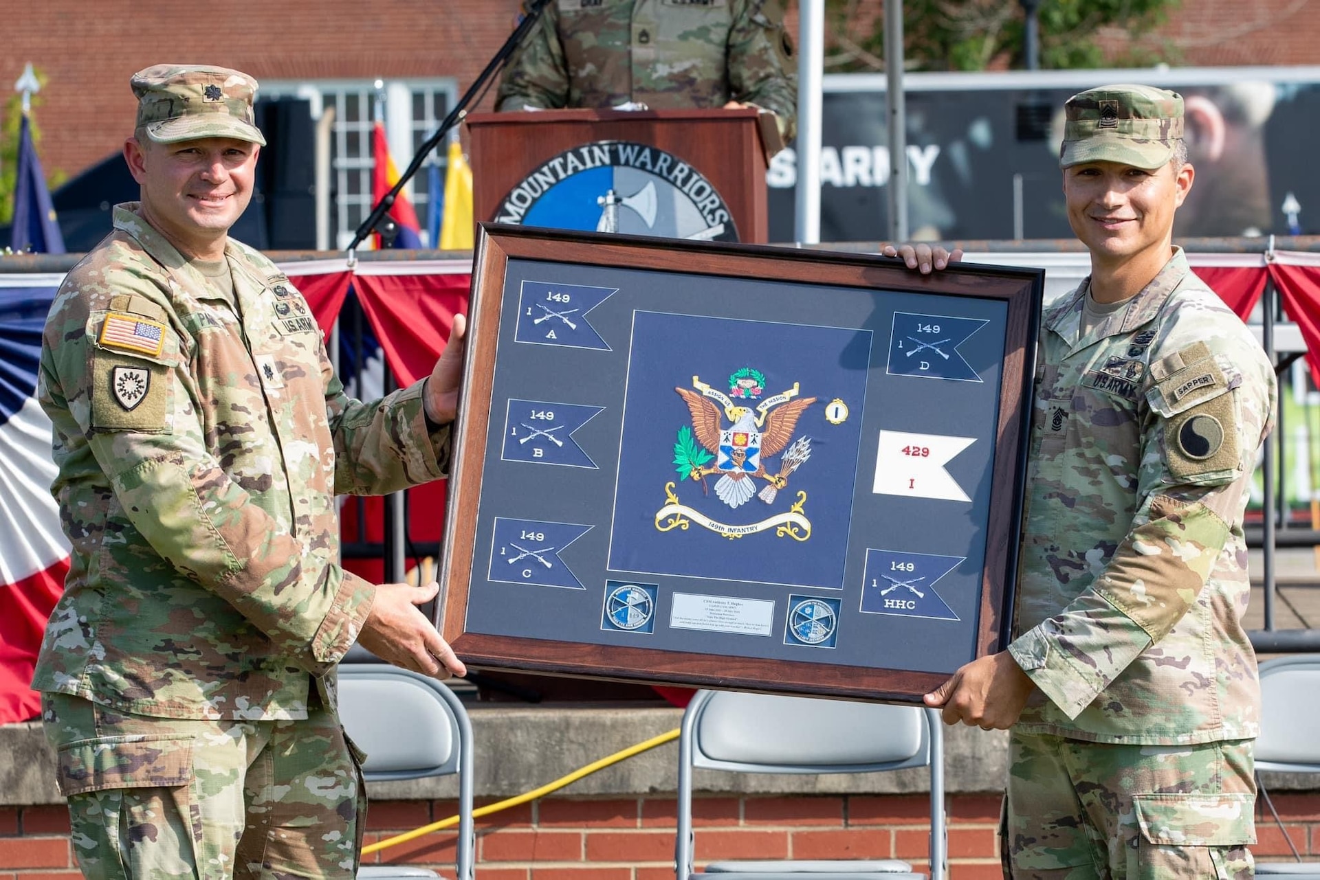 The 1st Battalion, 149th Infantry Regiment conducts a Change of Responsibility ceremony between outgoing Command Sgt. Maj. Anthony Hughes and incoming Command Sgt. Maj. Tim Lewis, during annual training at Fort Knox, Kentucky, July 20,2024