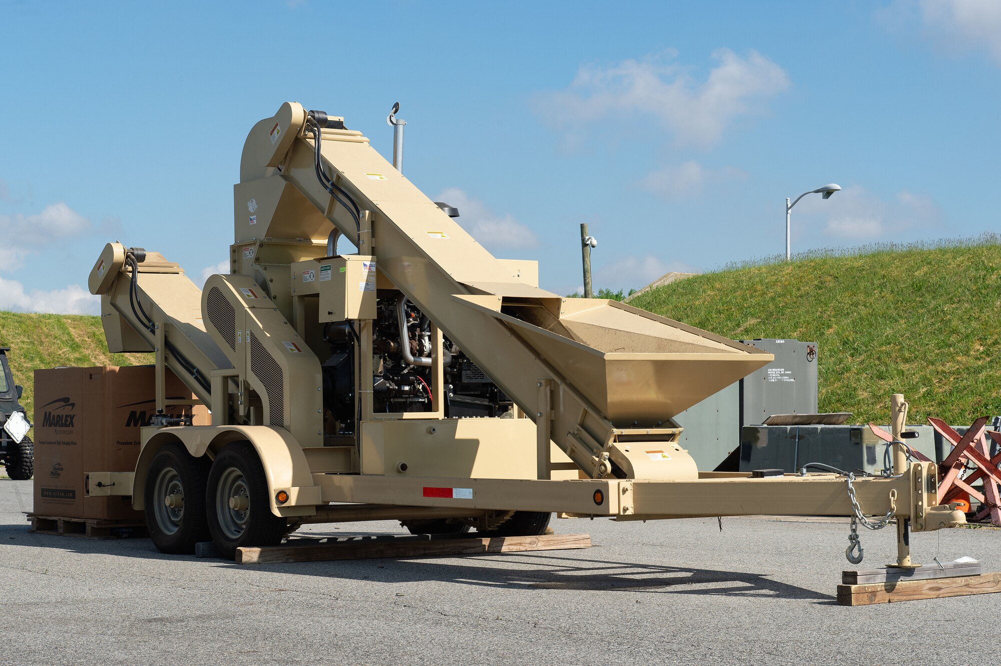 The 436th Maintenance Squadron Munitions Flight uses the deformer to demilitarize small caliber brass and aluminum munition cartridges at Dover Air Force Base, Delaware, May 1, 2024. From its first use in February 2019, proceeds from brass sales have paid for the deformer and are now generating revenue for the base. (U.S. Air Force photo by Roland Balik)