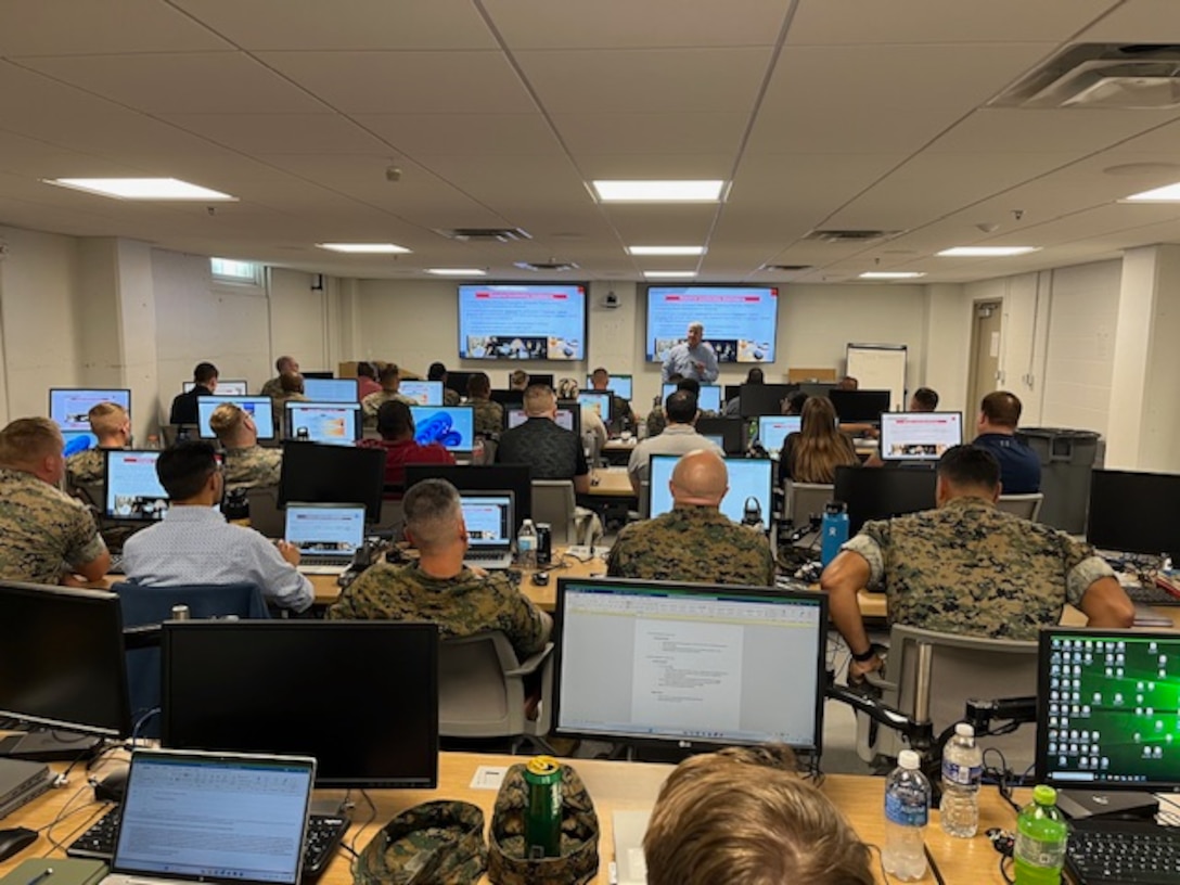 Mr. James Dollard, Marine Corps Insider Threat Program Manager, provides instruction at the Marine Corps Security Managers Course.