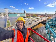 Taira Baldauf, a hydraulic engineers for the U.S. Army Corps of Engineers (USACE) Galveston District, stands on top of the Hollandsche IJssel storm surge barrier near Rotterdam, Netherlands. Baldauf recently spent five weeks in the Netherlands participating in the International Network for Storm Surge Barriers, or I-STORM, a knowledge sharing network of countries and entities that manage storm surge barriers.