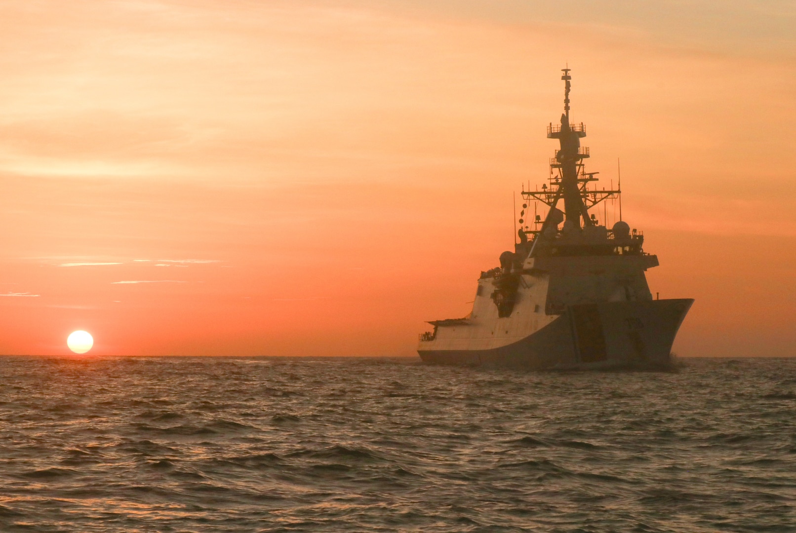 Coast Guard Cutter Stone steams in the Atlantic Ocean at sunset, July 1, 2024. Stone is operating in the U.S. 2nd Fleet area of operations in support of maritime stability and security in the region. (U.S. Coast Guard photo by Coast Guard Academy Cadet Jack Steel)