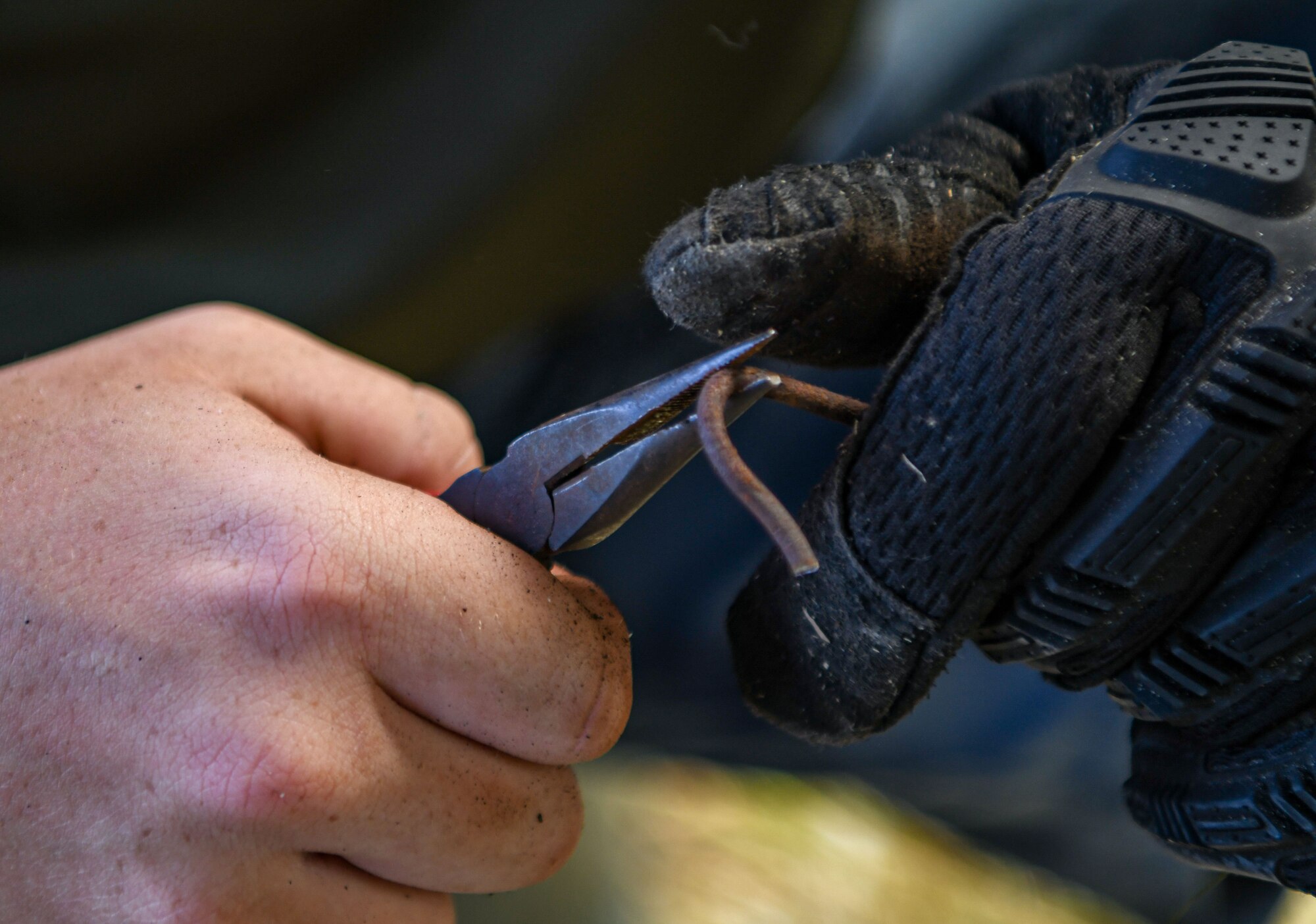 A detail shot of a hook being constructed.