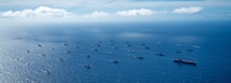 Multinational ships sail in formation July 22, off the coast of Hawaii during Exercise Rim of the Pacific (RIMPAC) 2024. Twenty-nine nations, 40 surface ships, three submarines, 14 national land forces, more than 150 aircraft and 25,000 personnel are participating in RIMPAC in and around the Hawaiian Islands, June 27 to Aug. 1.
