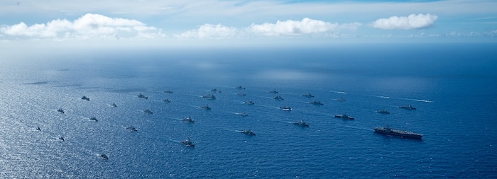 Multinational ships sail in formation July 22, off the coast of Hawaii during Exercise Rim of the Pacific (RIMPAC) 2024. Twenty-nine nations, 40 surface ships, three submarines, 14 national land forces, more than 150 aircraft and 25,000 personnel are participating in RIMPAC in and around the Hawaiian Islands, June 27 to Aug. 1.