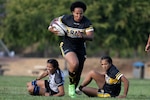 Army Maj. Danielle Deshaies breaks away during the 2024 Armed Forces Women’s Rugby Championships in San Diego, California, July 12, 2024. (DoD photo by EJ Hersom)